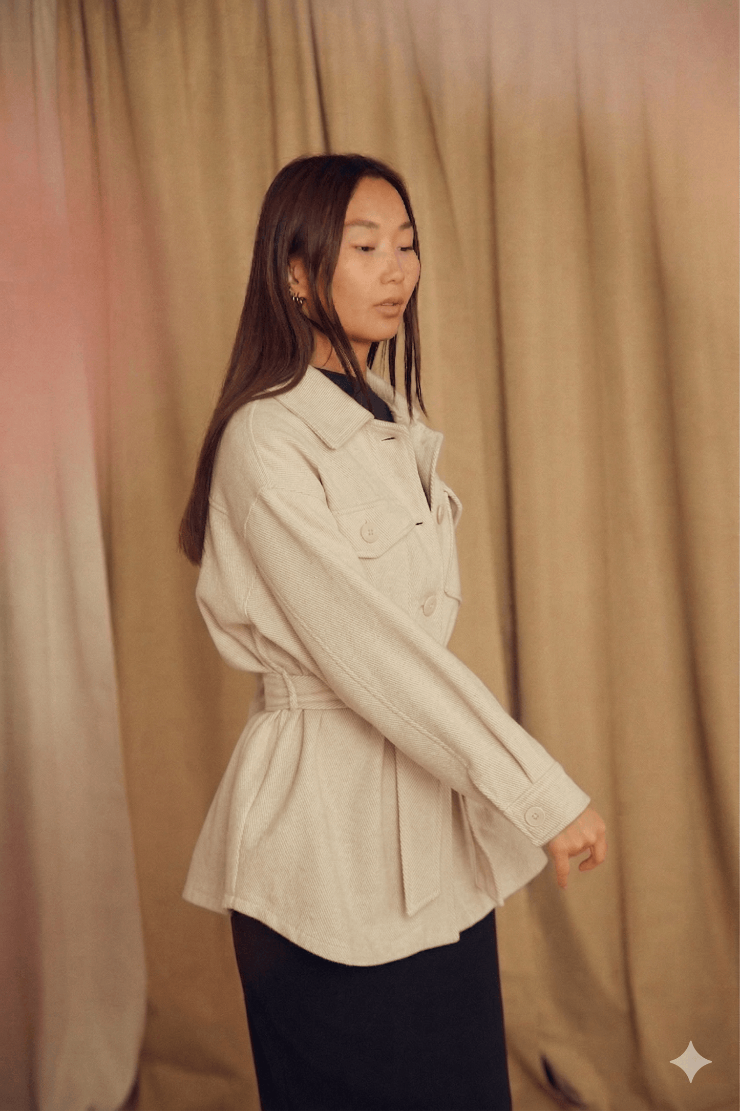 Ecru Organic Cotton Shacket worn by a model, showcasing its relaxed silhouette and detachable belt.