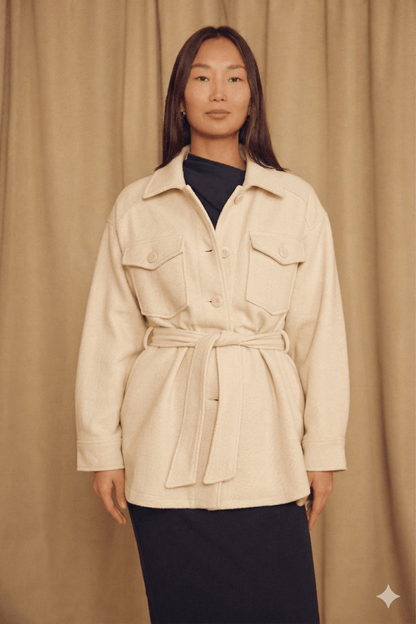Ecru Organic Cotton Shacket worn by a model, featuring oversized silhouette and detachable belt.