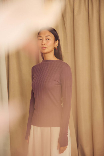 Cocoa Lyocell Ribbed Long Sleeve Top on a model against a light background showcasing its fine ribbed texture.
