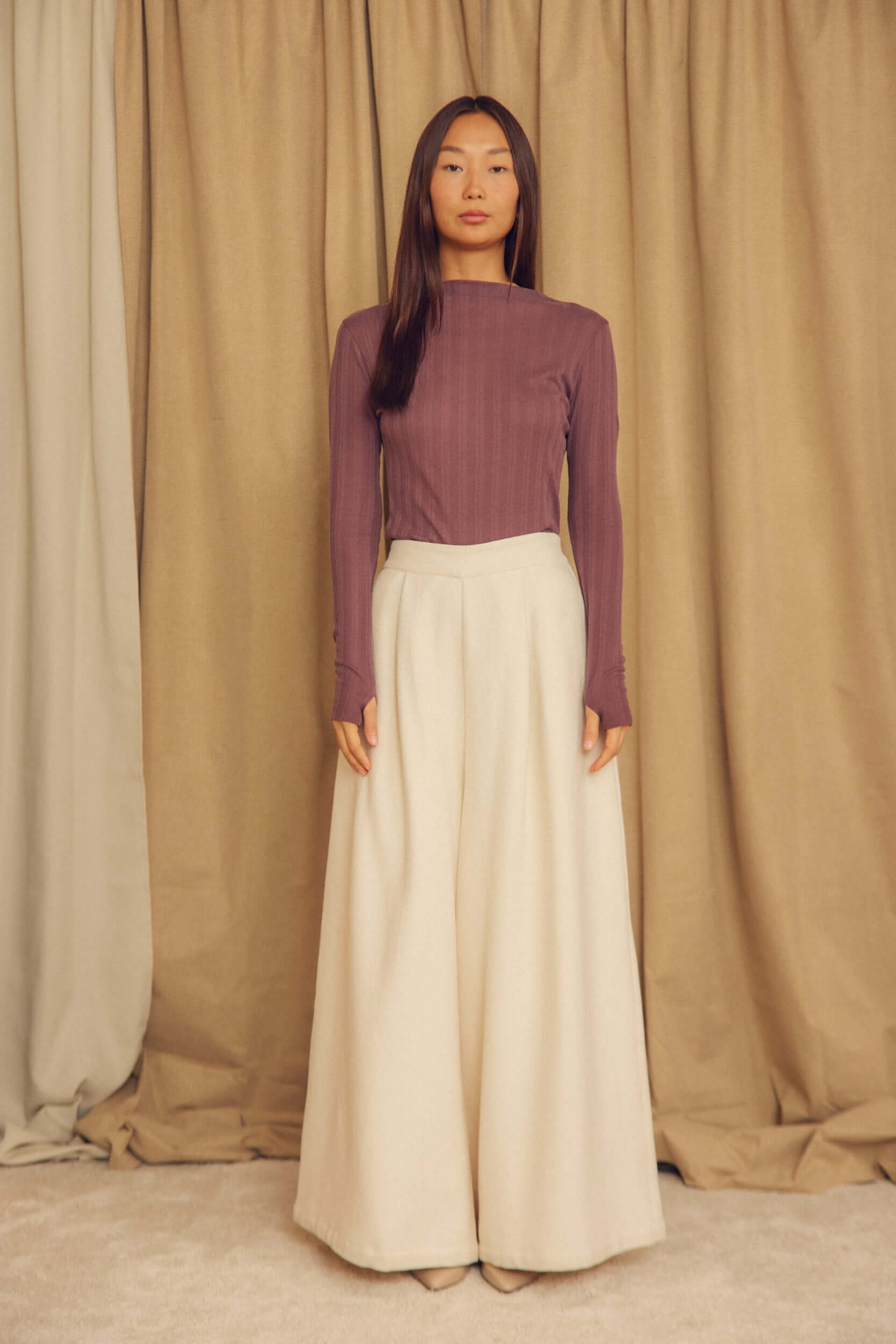 Ecru Organic Cotton Wide Trousers styled with a fitted long-sleeve top in a neutral background setting.