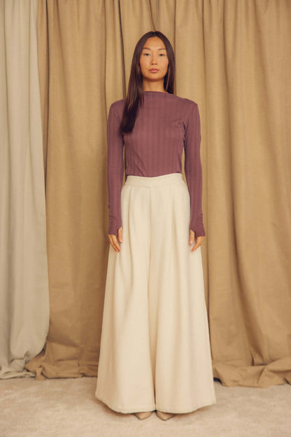 Ecru Organic Cotton Wide Trousers styled with a fitted long-sleeve top in a neutral background setting.