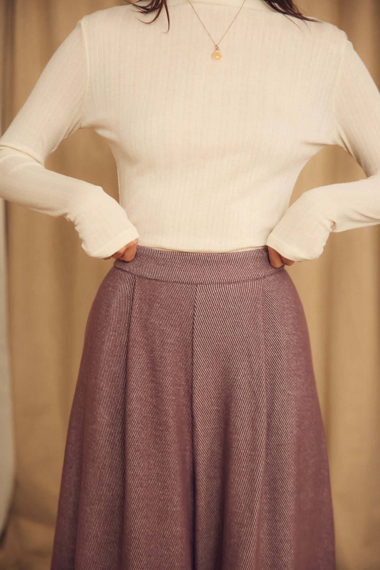 Cocoa Organic Cotton Wide Trousers styled with a fitted beige top, showcasing an oversized wide-leg silhouette.