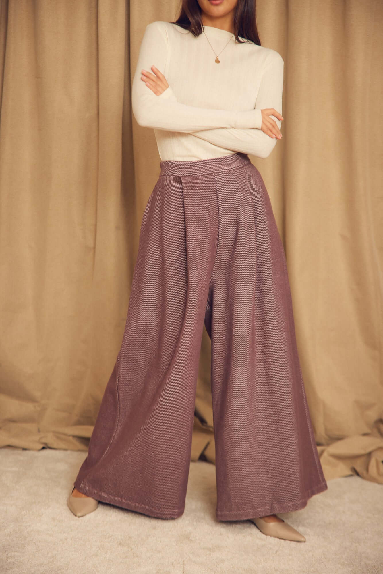 Cocoa Organic Cotton Wide Trousers styled with a neutral top, featuring oversized wide-leg silhouette and structured fabric.