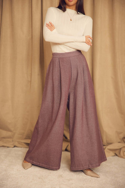 Cocoa Organic Cotton Wide Trousers styled with a neutral top, featuring oversized wide-leg silhouette and structured fabric.
