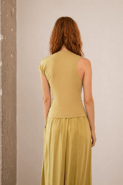 Drape Neckline Cupro Top in Soft Olive shown from the back, highlighting its refined fit and smooth jersey fabric.