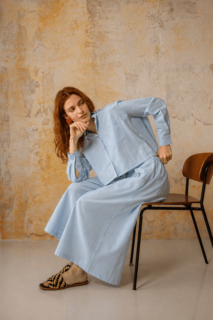 Model wearing Organic Cotton Wide Culottes in Pale Blue, styled for comfort and modern fashion.