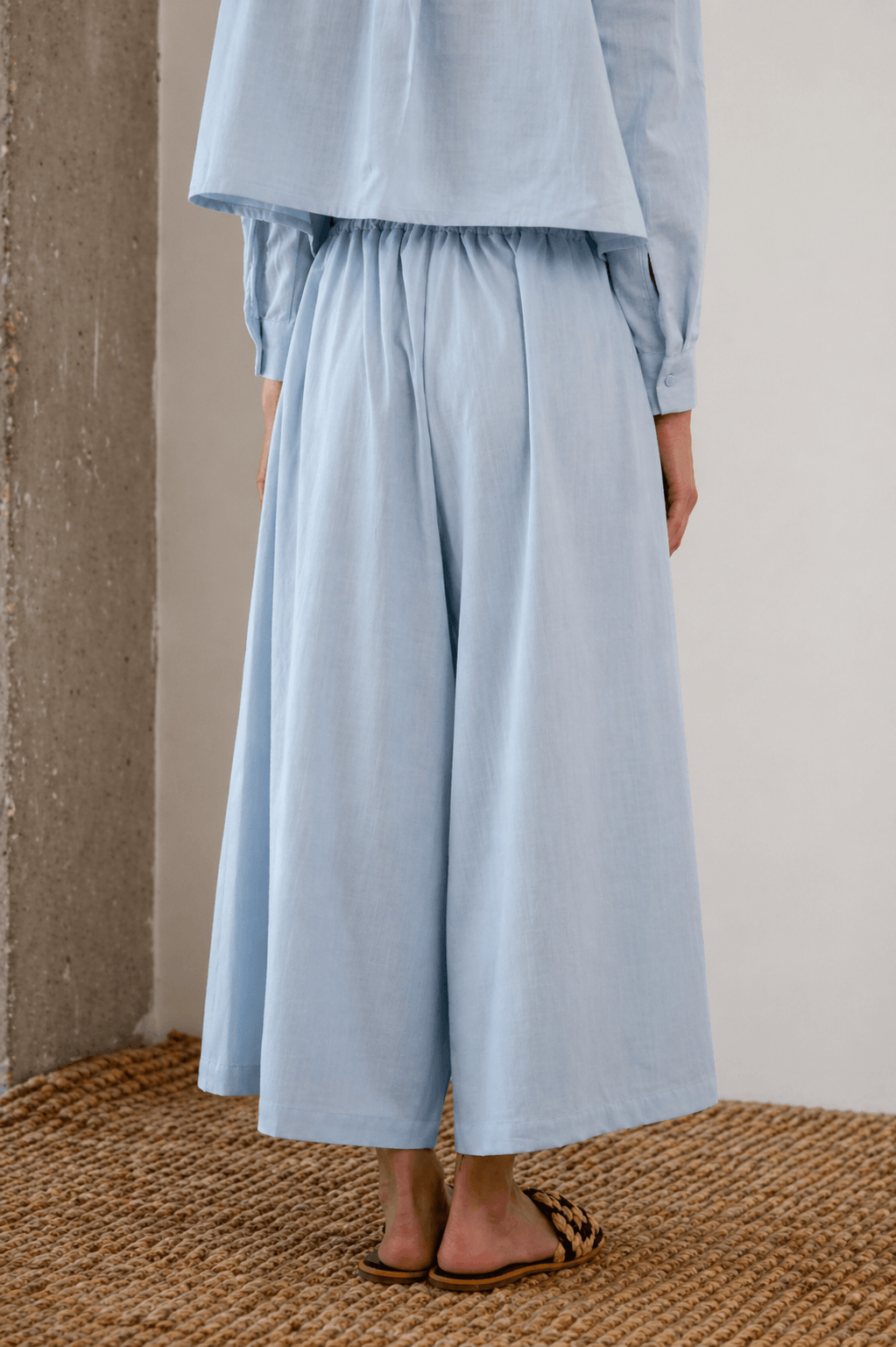 Organic Cotton Wide Culottes in Pale Blue, back view showcasing the relaxed silhouette and breathable fabric.