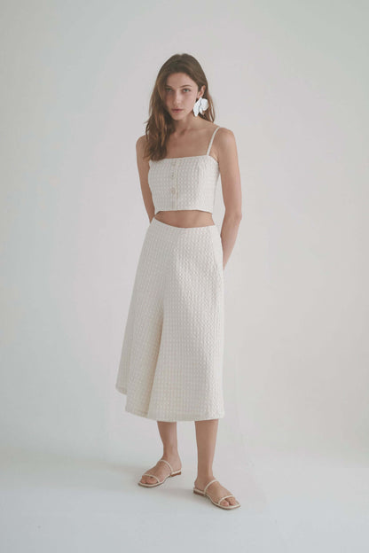 ECRU WAFFLE CROP TOP styled with matching culottes, showcasing breathable organic cotton blend in airy ecru color.