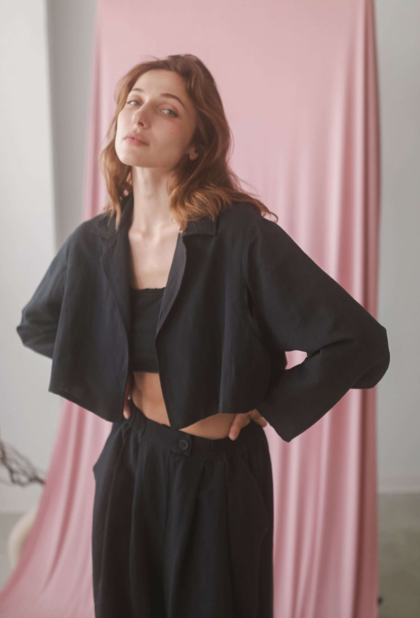 ECRU WAFFLE CROP JACKET styled with matching culottes, featuring lightweight and breathable fabric for summer layering.