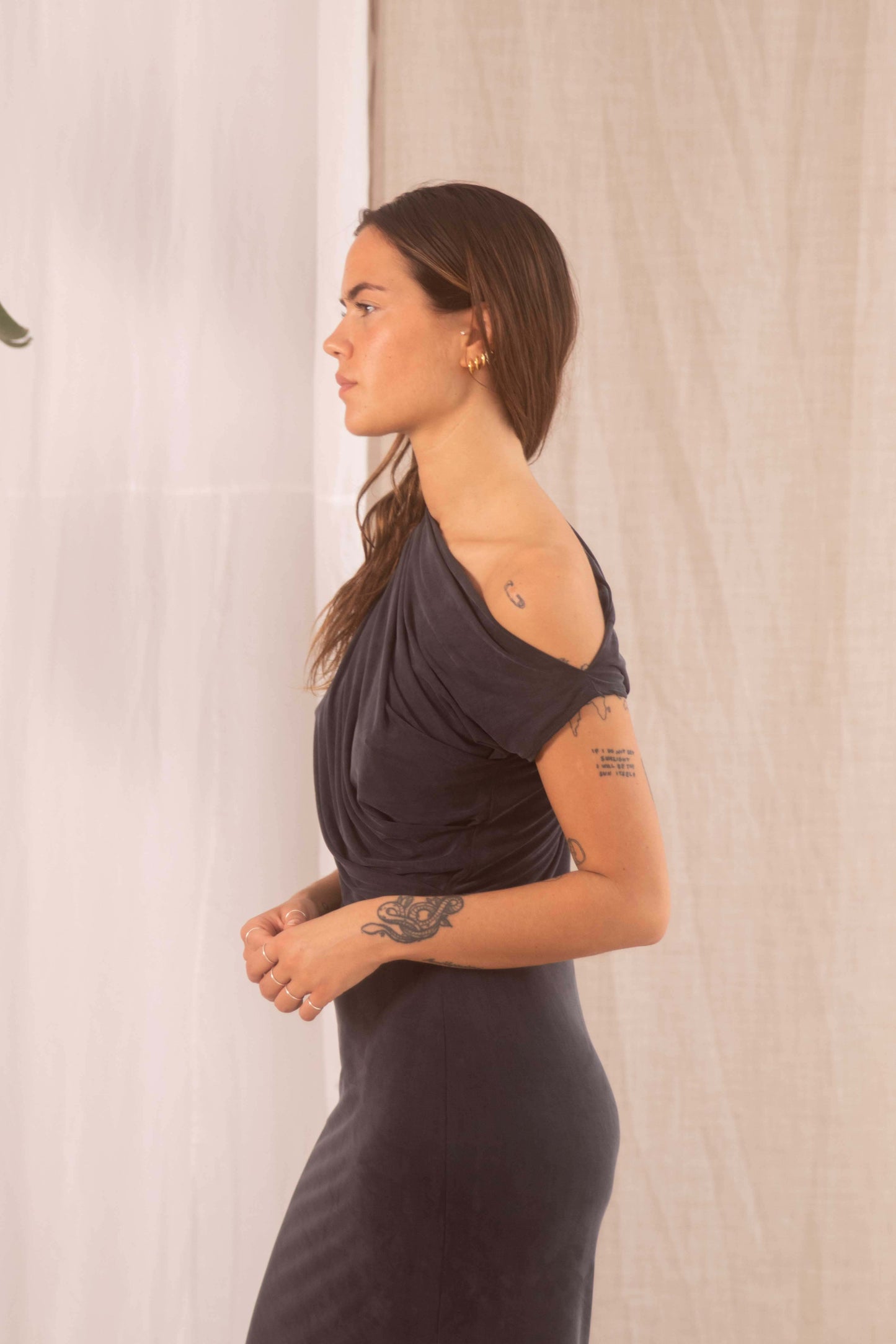 Drape Cupro Midi Dress in Slate Black worn by model showcasing elegant draped neckline and flattering fit.