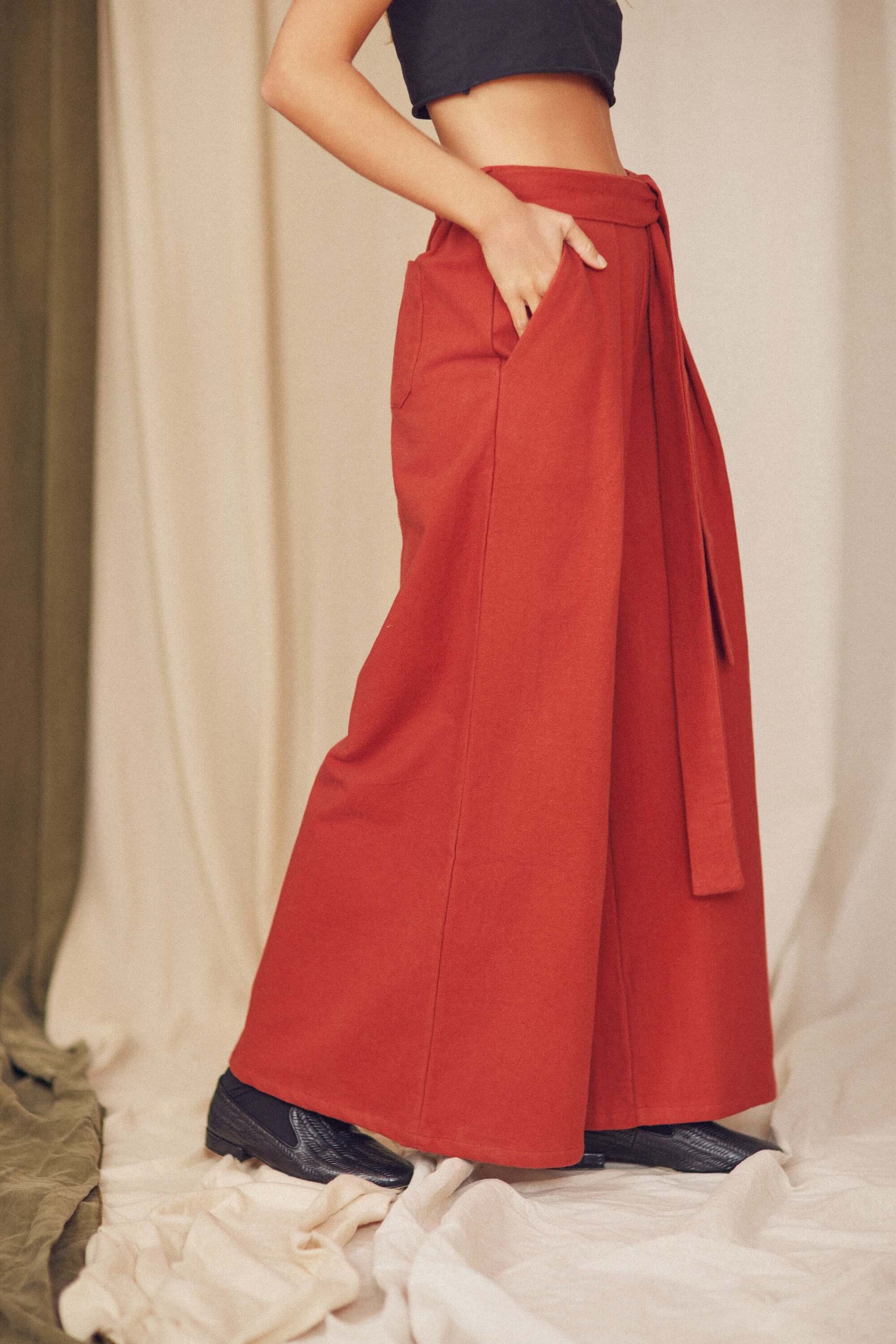 Rust Organic Cotton Wide Trousers showcasing a stylish silhouette and detachable belt, perfect for autumn layering.