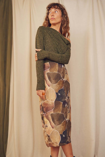 Model wearing a Printed Ecovero Pencil Midi Skirt with a green long-sleeve top, showcasing a modern, eco-friendly style.
