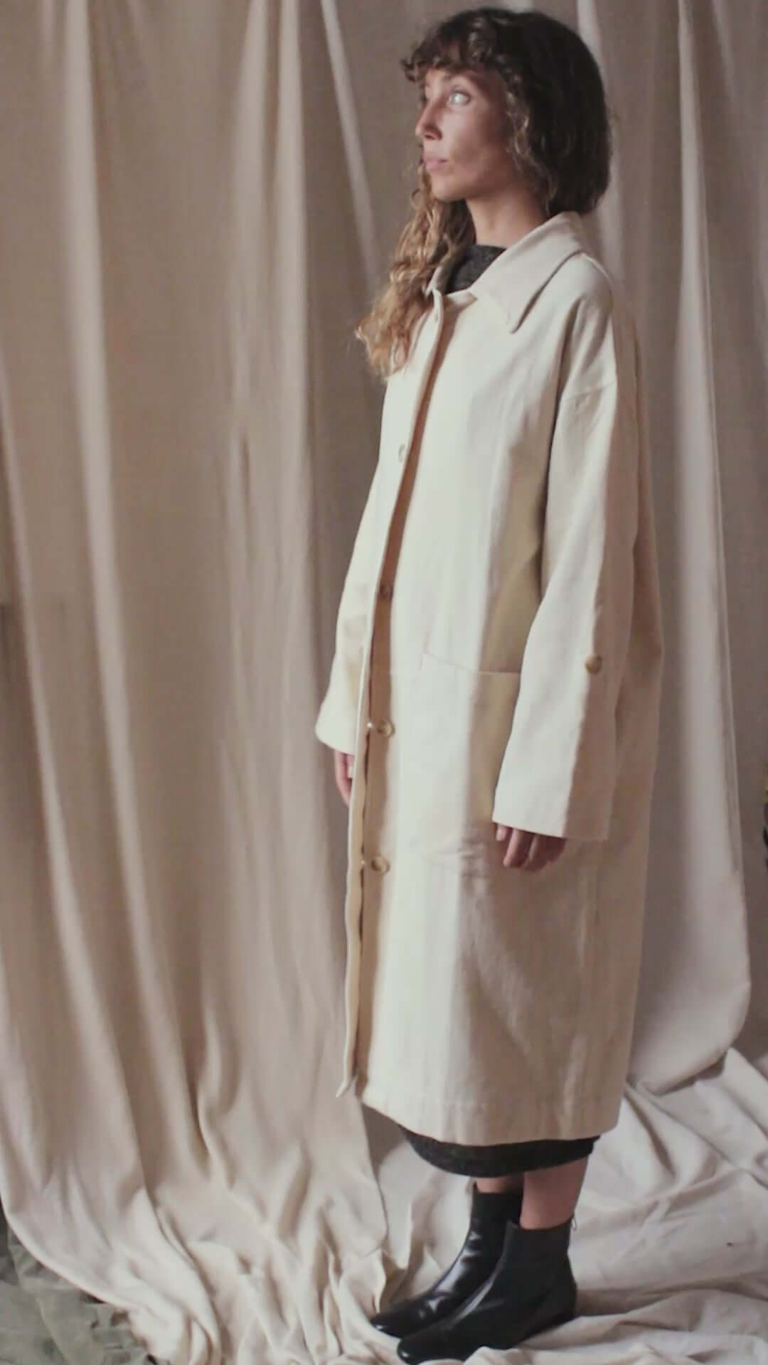 Oat Organic Cotton Long Wide Coat displayed on model against neutral backdrop, showcasing elegant oversized fit.